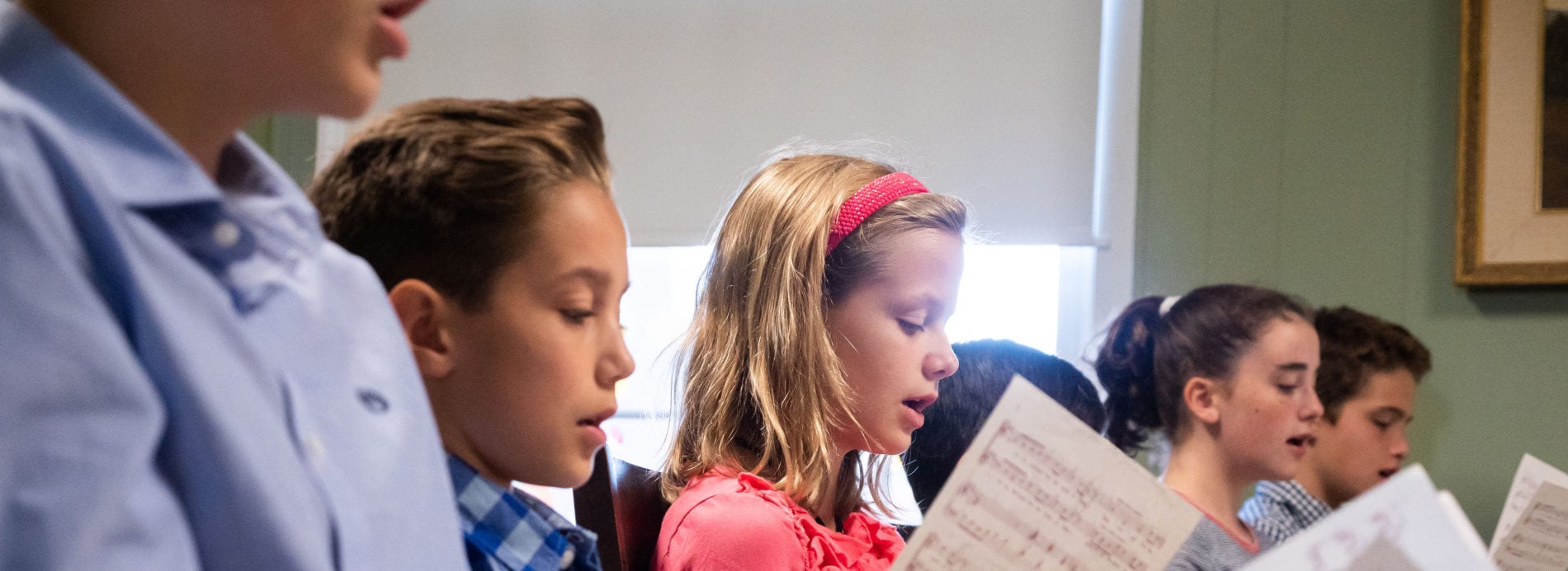 children rehearse for the children's choir
