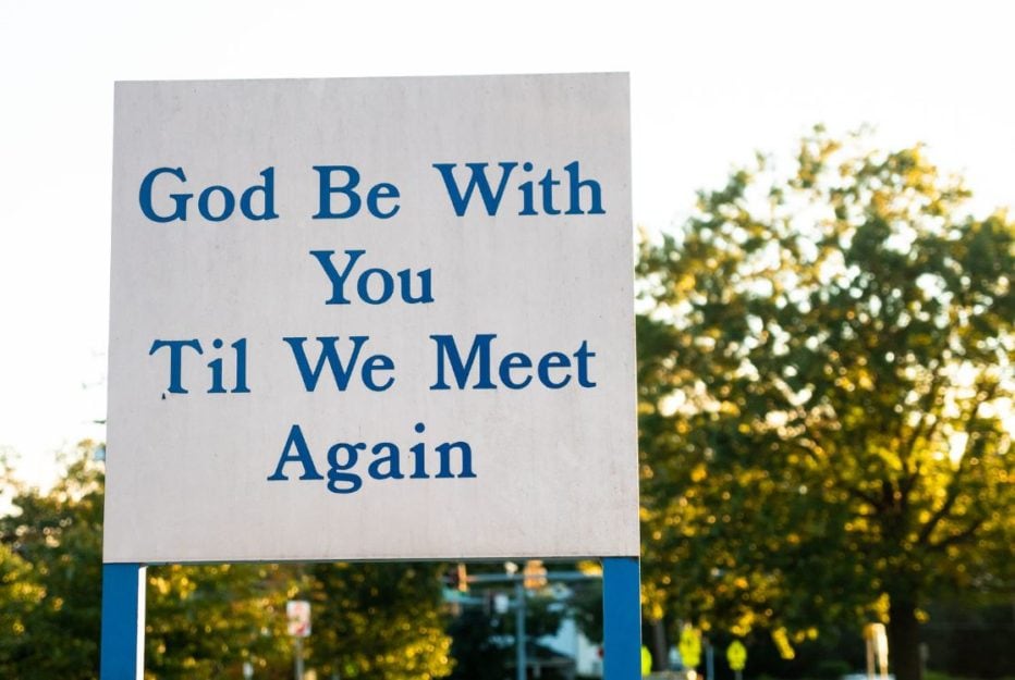 Sign saying God Be With You Til We Meet Again