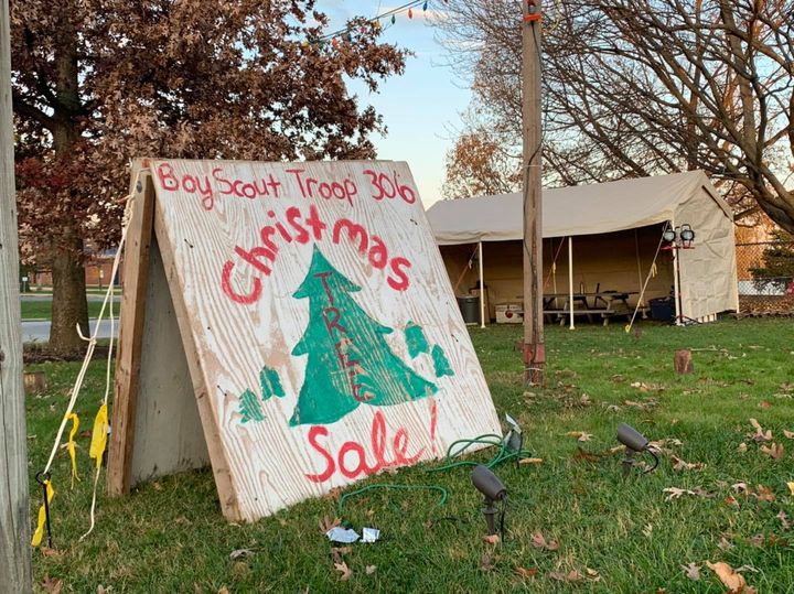 A sign reads, "Boy Scout Troop 306 Christmas Tree Sale"