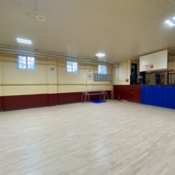 Open gymnasium with small exterior windows
