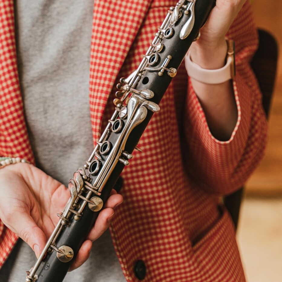 Woman holding clarinet